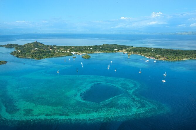 25 minutes Mamanuca Island Tour - Likuliku Lagoon Resort and the overwater bure look from above