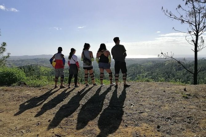 ATV Quad Bike and Zip Line Adventure Tour (Departs Nadi) - ATV riding in Fiji: rugged trails, sugarcane, and highland views