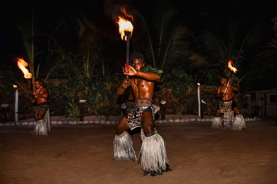 Fiji: Sunset Cruise with Dinner and Fire Show - Likuri Island welcome: ceremony, songs, then the lovo dinner