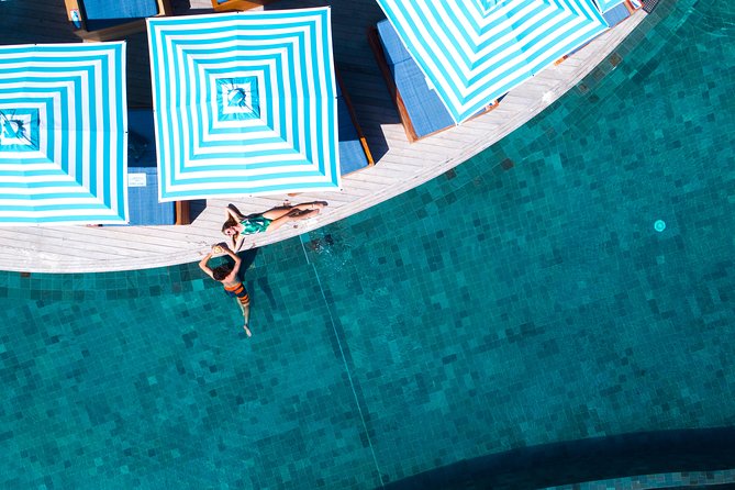 Malamala Beach Club - Full Day - Arriving at the club: white sand, cabanas, and Mamanucas views