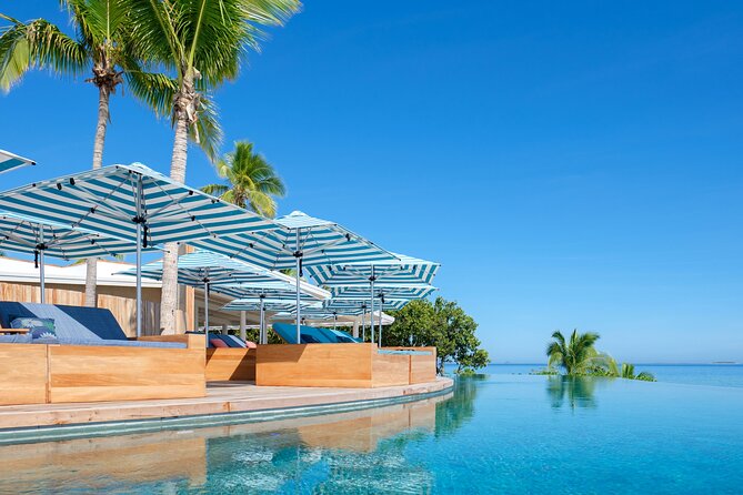 Malamala Beach Club - Full Day - Snorkelling, kayaking, and stand-up paddle boarding with included gear