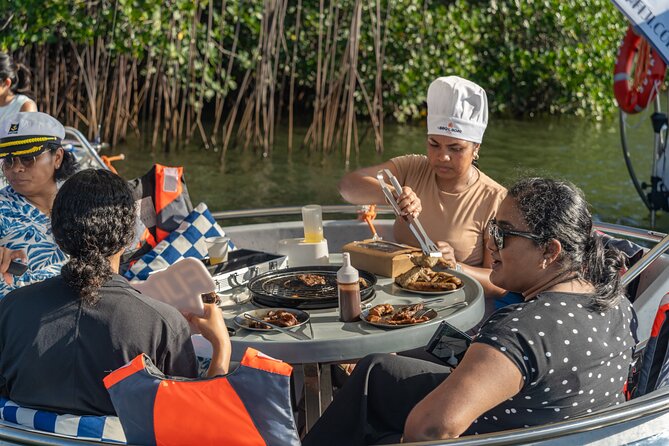 Self Drive BBQ eBoat Cruise with Onboard BBQ Denarau Fiji - Onboard fun beyond eating: fishing, karaoke, and a little party energy